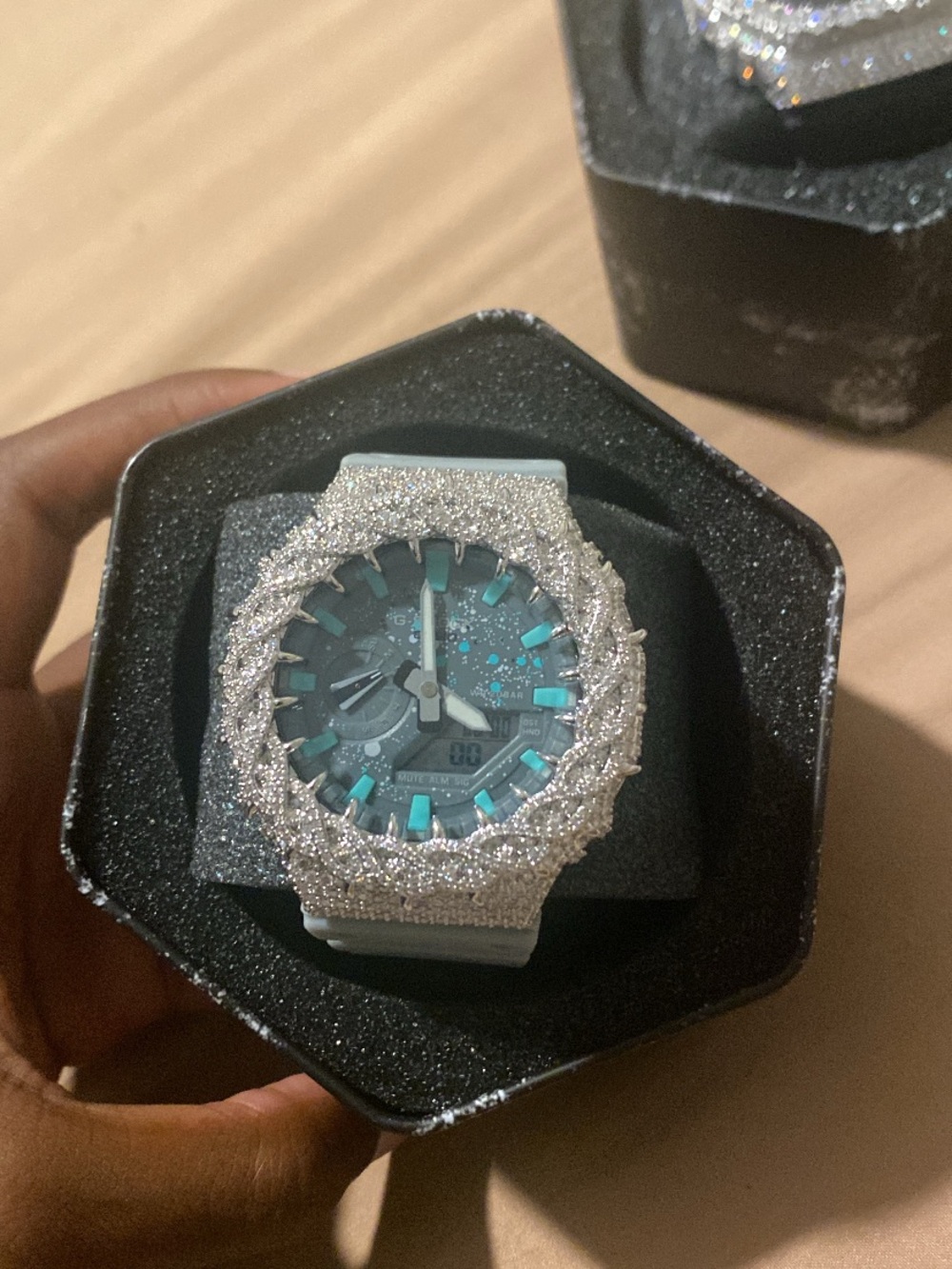 Casio teal dial silver glitter bezel smartwatch
